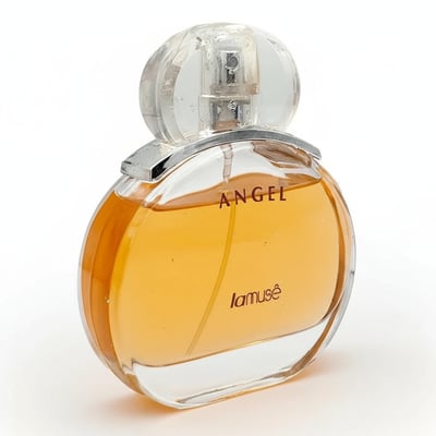 Lattafa Angel by LaMuse — Round glass perfume bottle with amber liquid, clear spherical cap, and silver accent.
