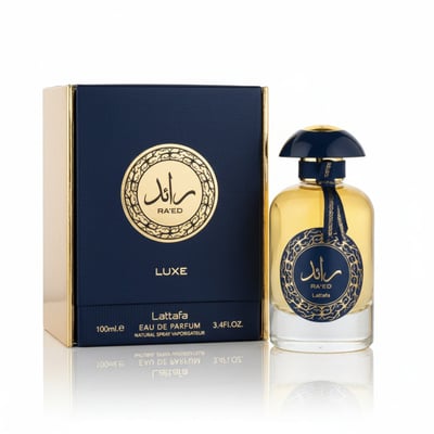 Lattafa Raed Luxe by Lattafa 100ml EDP Unisex — A navy blue and gold box sits next to a clear glass perfume bottle with yellow liquid and a navy blue cap, featuring a gold circular emblem.