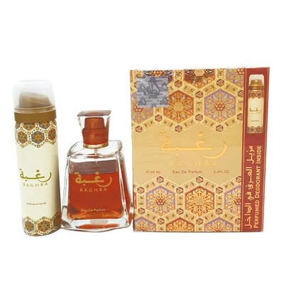 Lattafa Raghba by Lattafa 100ml EDP Unisex — A perfume bottle, a deodorant spray, and a perfume box are arranged together. The perfume bottle is clear glass with orange liquid and a gold cap. The deodorant spray is white with gold accents. The box is gold with intricate patterns and features a smaller image of the