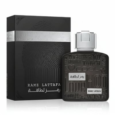 Lattafa Ramz Silver by Lattafa 100ml EDP for Men — Black textured box with fingerprint design next to a silver-capped black perfume bottle with embossed text.