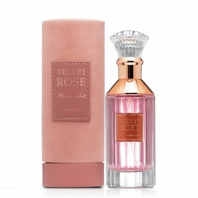 Lattafa Velvet Rose by Lattafa 100ml Unisex — Pink velvet cylindrical box and a clear glass perfume bottle with pink liquid and rose gold accents, set against a white background.
