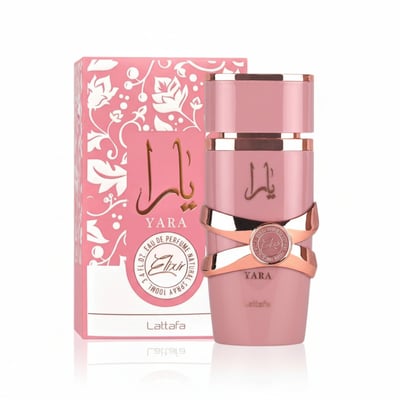 Lattafa Yara Elixir by Lattafa 100ml EDP — Pink perfume bottle with gold accents and a decorative ribbon, next to its matching pink floral patterned box.