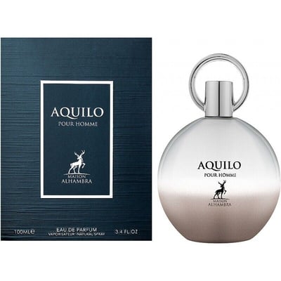 Maison Alhambra Aquilo Pour Homme — Dark blue textured box next to a round silver and rose gold gradient perfume bottle with a silver ring cap.