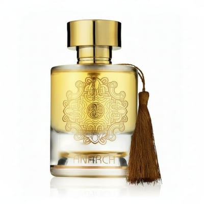 Maison Alhambra Anarch by Maison Alhambra 100ml EDP Women — Clear glass perfume bottle with gold ornate design and a brown tassel.