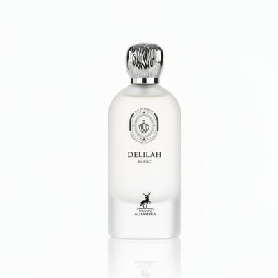 Maison Alhambra Delilah Blanc by Maison Alhambra 100ml EDP — White frosted glass bottle with a silver patterned cap, featuring a shield logo and a deer silhouette.