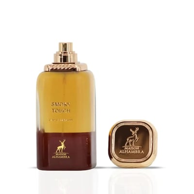 Maison Alhambra Smoky Touch by Maison Alhambra 80ml EDP — A clear glass perfume bottle with yellow and brown liquid, and a separate gold cap with a deer logo.