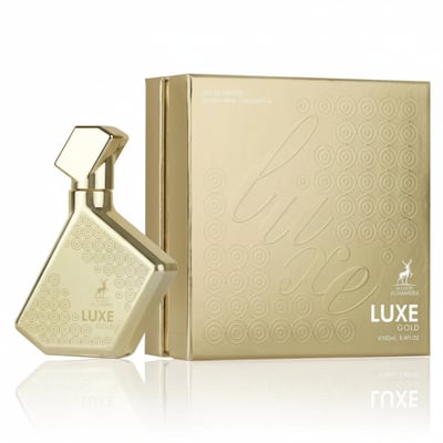 Maison Alhambra Luxe Gold by Maison Alhambra – 100 ml Unisex, a gold perfume bottle with a geometric design and a matching gold box with embossed circular patterns and the brand logo