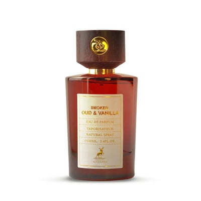 Maison Alhambra Smoked Oud & Vanilla by Maison Alhambra 100ml EDP — Amber glass perfume bottle with a wooden cap featuring a gold emblem, white label with gold text and a deer illustration.