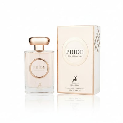 Maison Alhambra Pride by Maison Alhambra 100ml EDP Women — A clear glass perfume bottle with a rose gold cap and a circular label featuring the word 'PRIDE' in gold, placed next to its matching rose gold and white box.