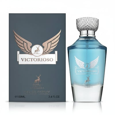 Maison Alhambra Victorioso by Maison Alhambra 100ml EDP Men — A dark grey box with gold winged emblem and 'VICTORIOSO' text stands next to a clear glass perfume bottle with blue liquid and a silver textured cap.