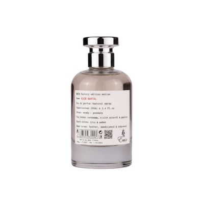 Paris Corner Rich Santal Emir by Paris Corner 100 ml — Clear glass perfume bottle with a silver cap, showing the label with fragrance notes and details.