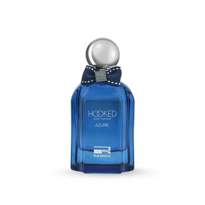 Rue Broca Hooked Azure Pour Homme — Blue glass perfume bottle with a navy blue ribbon bow and a clear spherical cap, white text labels.