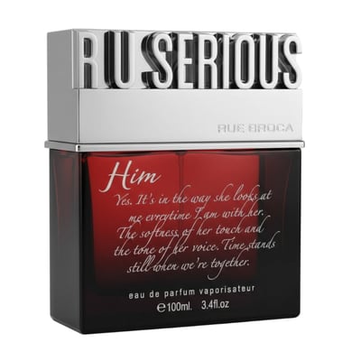 Rue Broca R U Serious Him EDP — Red glass perfume bottle with silver cap featuring raised 'R U SERIOUS' lettering, text overlay with poem and product details.