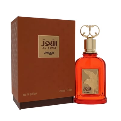 Zimaya Al Fouz by Zimaya 100ml EDP Unisex — Orange glass perfume bottle with gold falcon emblem and ornate gold cap, next to its brown textured box.
