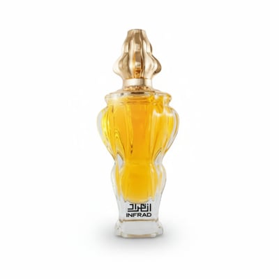 Zimaya Infrad Luxe by Zimaya 100ml EDP for Women — A clear glass perfume bottle with golden ornate cap, filled with golden liquid, against a white background.