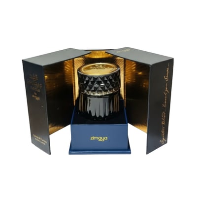 Zimaya Sharaf The Club by Zimaya 100ml Extrait Men — Black faceted perfume bottle with gold cap, presented in an open black and gold box.