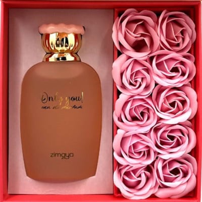 Zimaya Only You by Zimaya Perfume Elixir 100ML EDP — Frosted brown perfume bottle with gold cap and pink wavy detail, next to a box of pink rose-shaped soaps.
