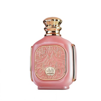 Zimaya Zukhruf Femme Pink by Zimaya 100ml EDP Women — A pink perfume bottle with ornate gold detailing on the front and a gold cap, set against a white background.