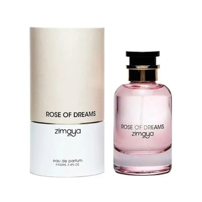 Zimaya Rose of Dreams — Pink perfume bottle with gold accents next to its cylindrical cream and white packaging, both featuring the product name and brand.