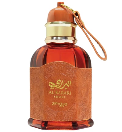 Zimaya Al Barari Shore by Zimaya 100 ml EDP — Amber glass perfume bottle with a textured brown leather-like band, gold accents, and a brown cap with a leather strap.