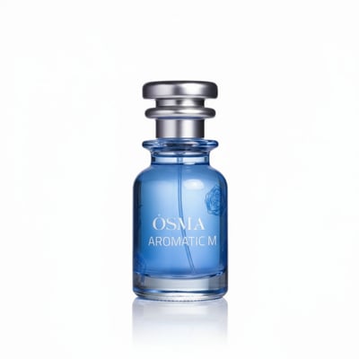 Osma Aromatic M Essence of Nature 75ml — Blue glass perfume bottle with silver cap, featuring subtle rose imprints and white text 'OSMA AROMATIC M'.
