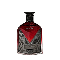 Maison Alhambra Victorioso Fearless by Maison Alhambra 100ml EDP — Botol minyak wangi kaca merah menarik dengan aksen logam gelap bertekstur dan penutup hitam, tertulis 'FEARLESS' dan 'VICTORIOSO'.