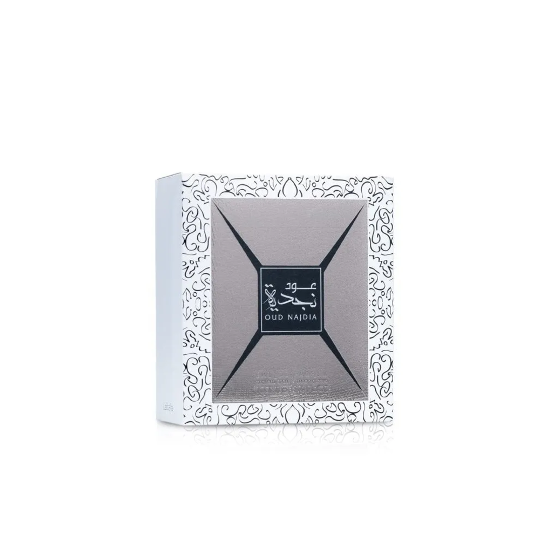 Afnan Supremacy Noir by Afnan 100ml EDP Men — Black perfume bottle and matching box with embossed leaf design on white