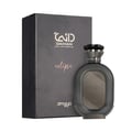 Zimaya Daiman Eclipse Eau De Parfum — A dark grey textured box stands next to a matching oval-shaped perfume bottle with a metallic grey textured finish and a decorative cap. | Zimaya Daiman Eclipse Eau De Parfum — Kotak kelabu gelap bertekstur berdiri di sebelah botol minyak wangi berbentuk bujur yang sepadan dengan