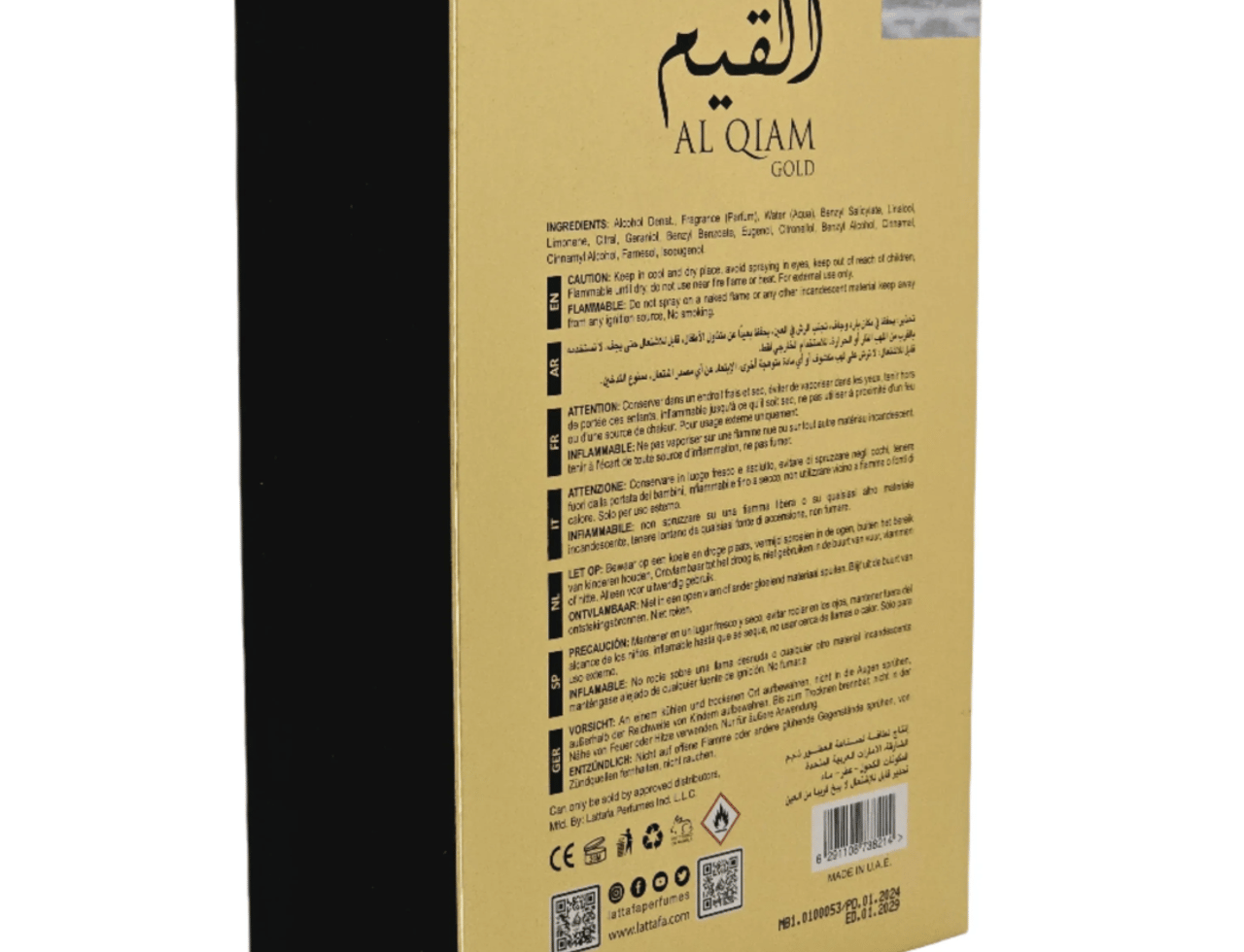 Lattafa Pride Al Qiam Gold by Lattafa Pride 100ml EDP — Tulisan kaligrafi emas Arab pada kotak putih dengan butiran produk dan amaran pelbagai bahasa.