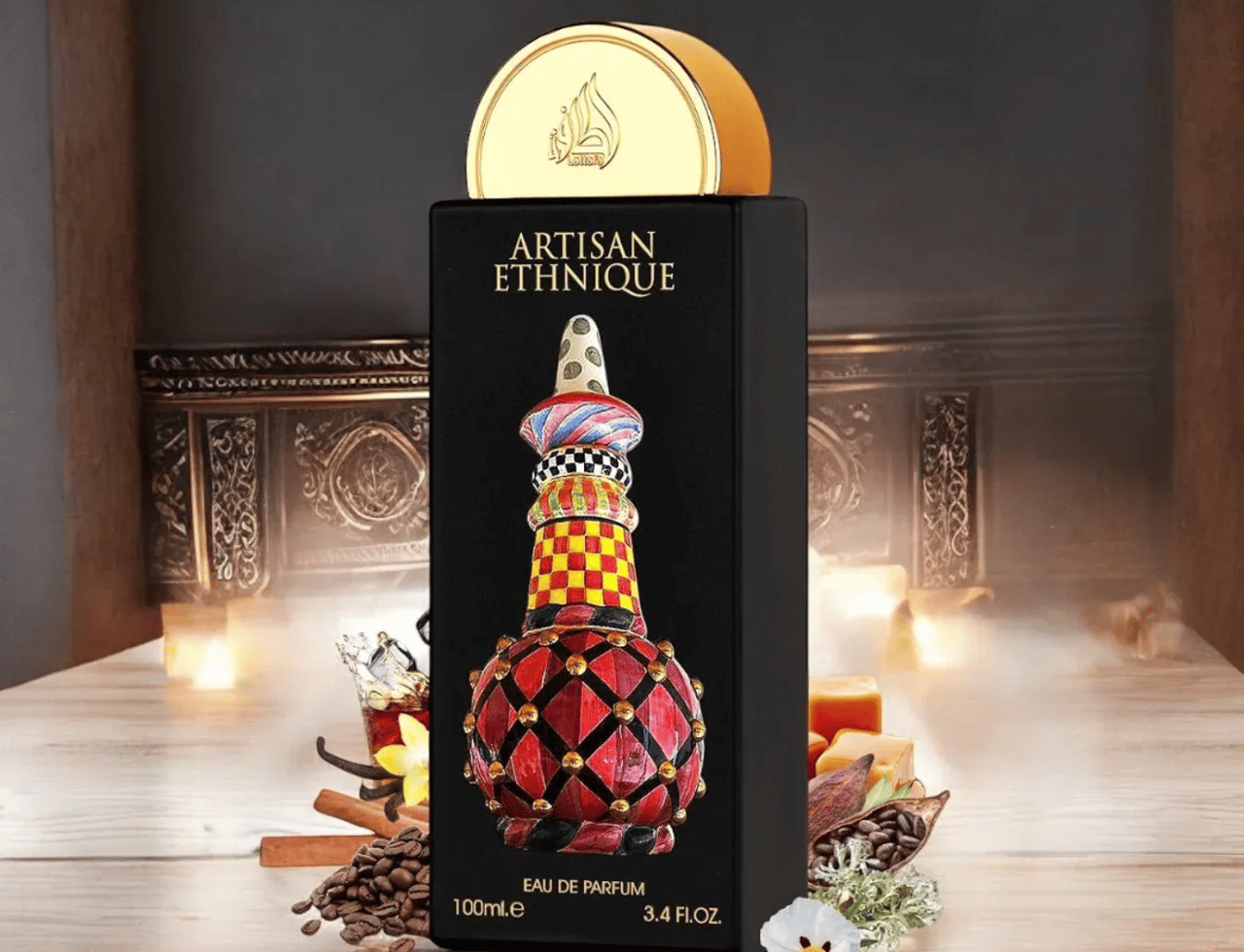 Lattafa Pride Artisan Ethnique by Lattafa Pride 100ml EDP — Black bottle with ornate, colorful stacked design, gold cap with Arabic script, surrounded by coffee beans, cinnamon sticks, and a white flower on a wooden surface.