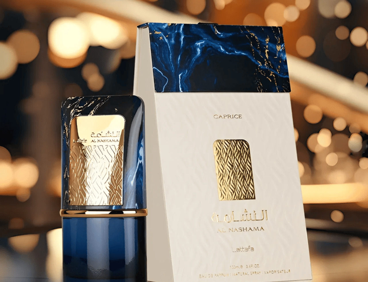 Al Nashama Caprice by Lattafa — Blue marble patterned perfume bottle and box with gold accents against a bokeh background.