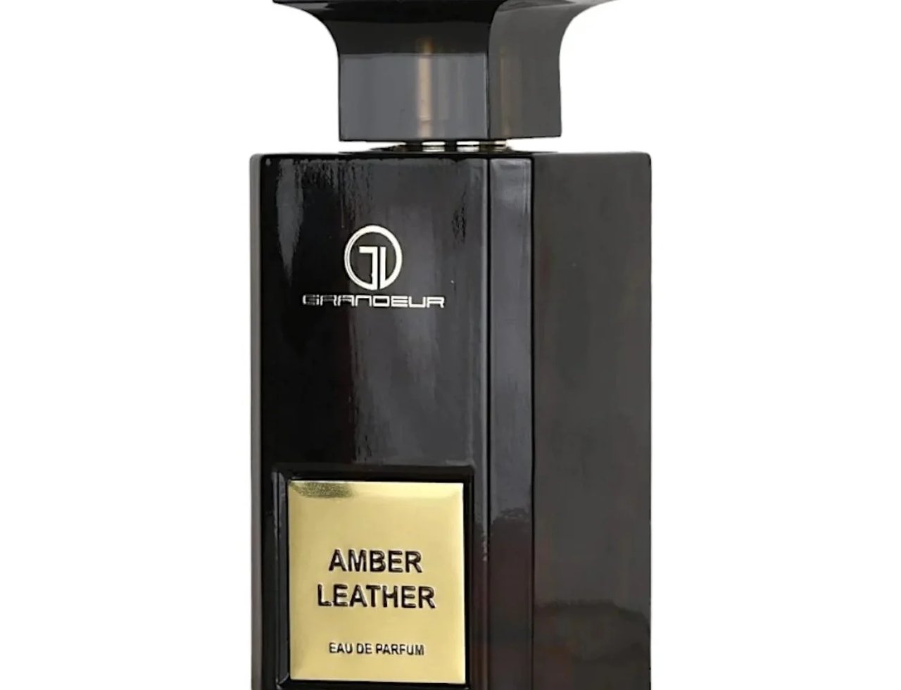 Grandeur Amber Leather 100ml by Grandeur Perfumes — Botol minyak wangi hitam berkilat dengan penutup hitam, label emas bertulis 'AMBER LEATHER' dan 'EAU DE PARFUM'