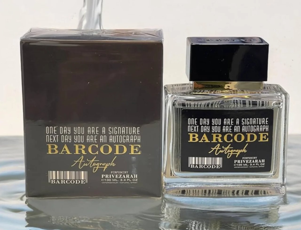 Paris Corner Autograph 100ml — A perfume box and bottle are displayed on a reflective surface with water effects, with a stream of water pouring from above. | Paris Corner Autograph 100ml — Kotak dan botol minyak wangi dipamerkan di permukaan reflektif dengan kesan air, dengan aliran air mengalir dari atas.