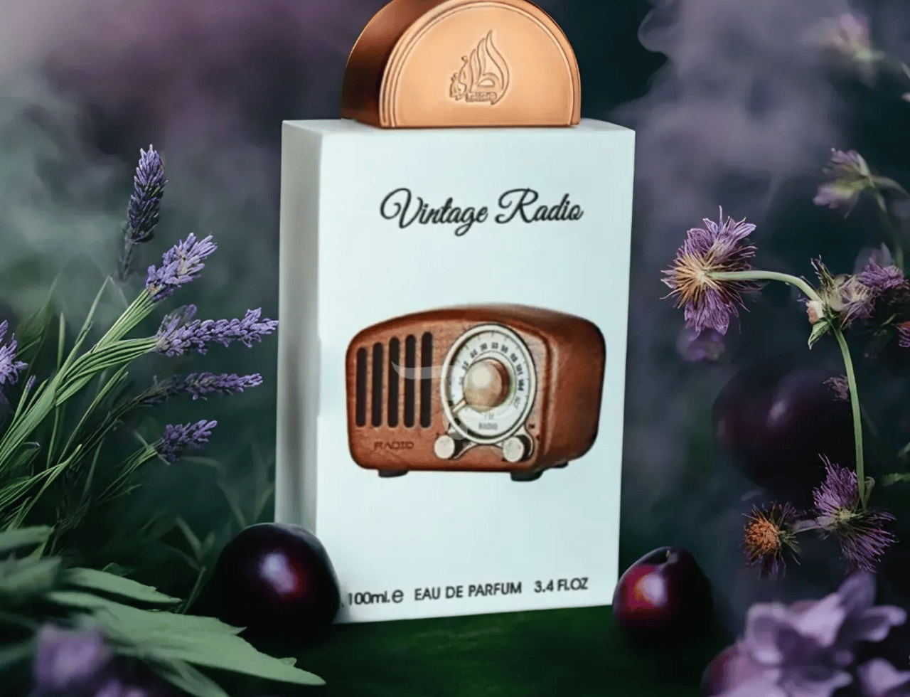 Lattafa Pride Vintage Radio by Lattafa Pride 100ml EDP — White box with a vintage radio illustration, topped with a copper cap, surrounded by lavender sprigs and dark berries.