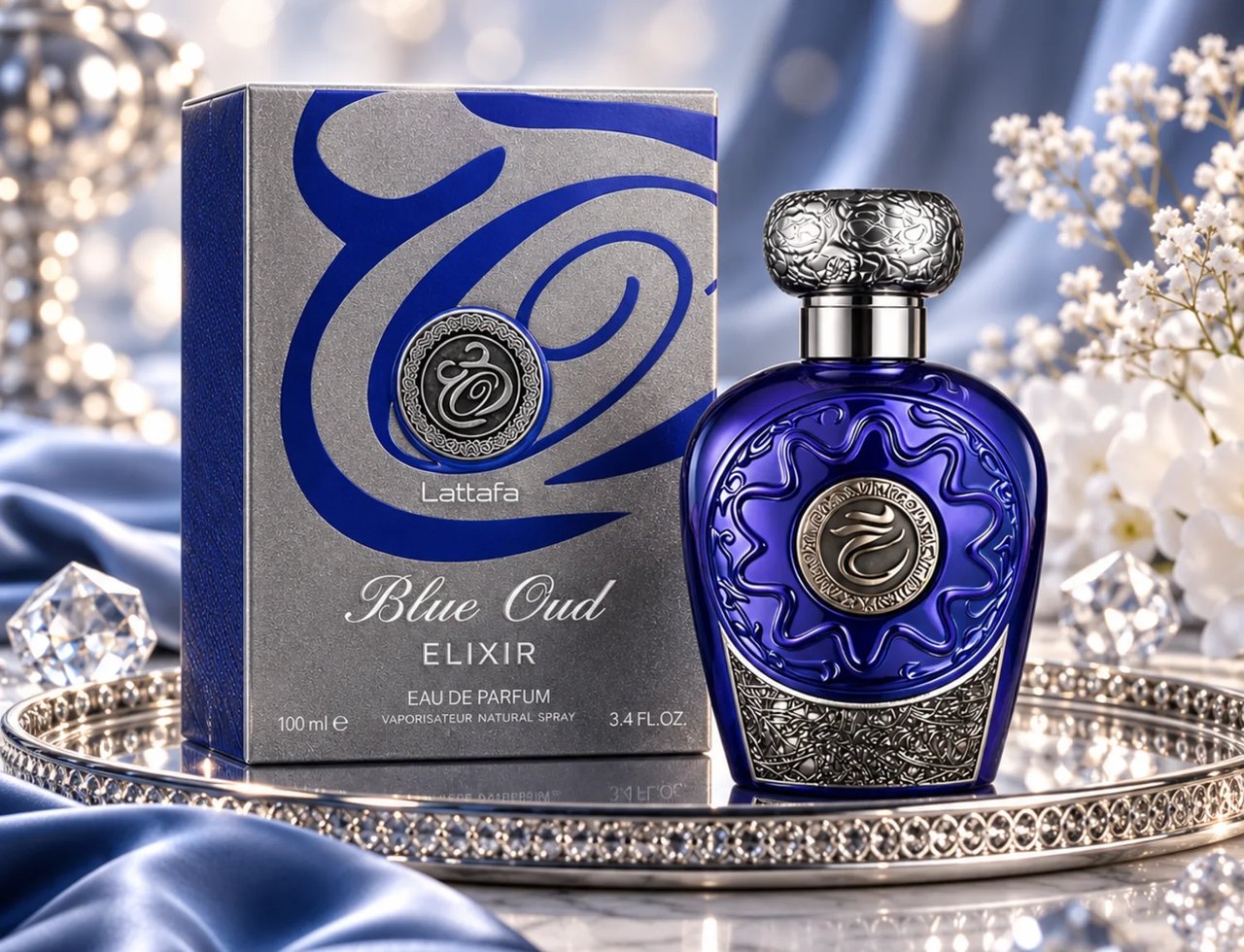Lattafa Blue Oud Elixir by Lattafa 100ml EDP Unisex — A blue glass perfume bottle and its silver box sit on a decorative silver tray with blue satin fabric and crystal accents.