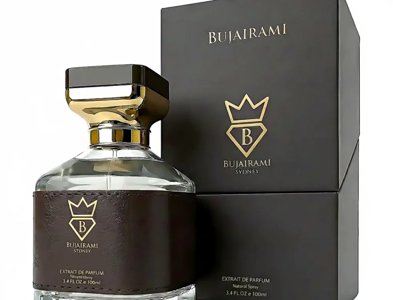 Bujairami Boss Life by Bujairami 100ml Extrait de Parfum — Clear glass perfume bottle with brown leather wrap and gold cap, next to its dark grey branded box.