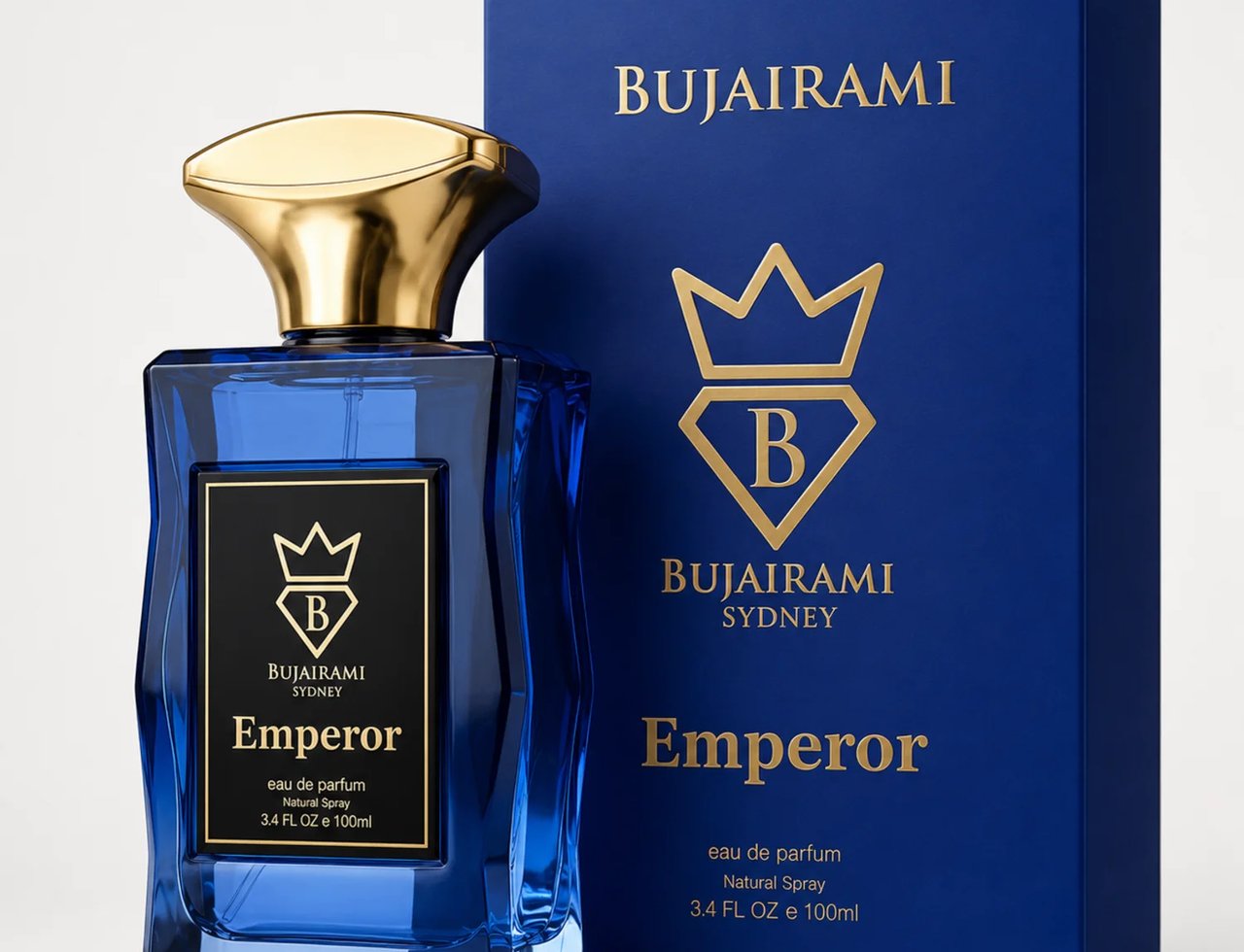Bujairami Emperor — Blue glass perfume bottle with gold cap next to its blue box, both featuring the Bujairami logo and 'Emperor' text.