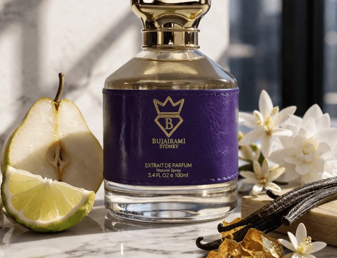 Bujairami Executor by Bujairami 100ml Extrait de Parfum — Botol minyak wangi mewah berbalut kulit ungu dan perincian emas, dikelilingi hirisan pir segar, limau, kacang vanila, dan resin ambar di atas permukaan marmar.