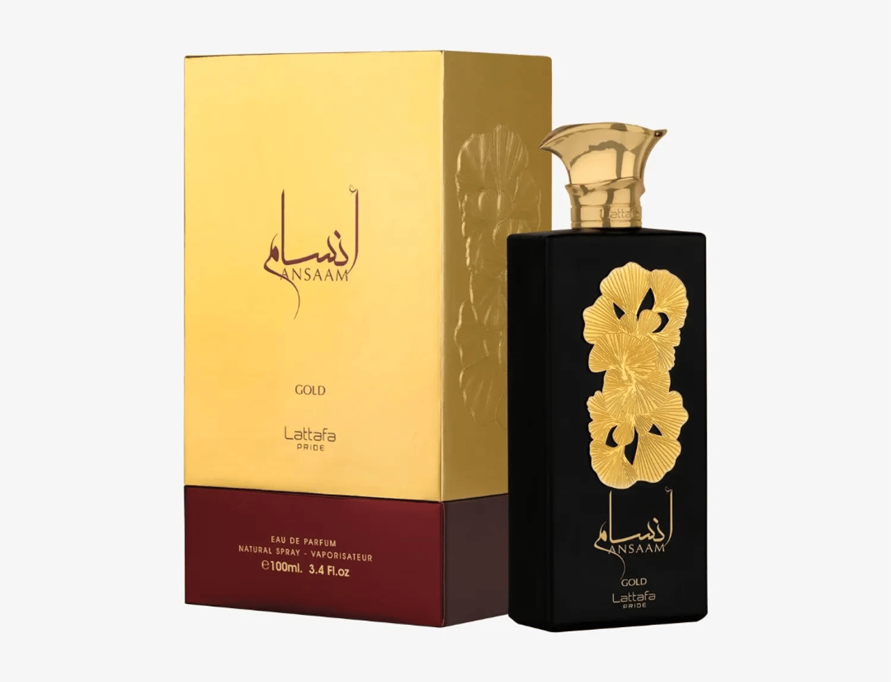 Lattafa Pride Ansaam Gold EDP — Botol minyak wangi hitam dengan rekaan bunga emas dan penutup emas, bersebelahan kotak emas dan merah maroon.