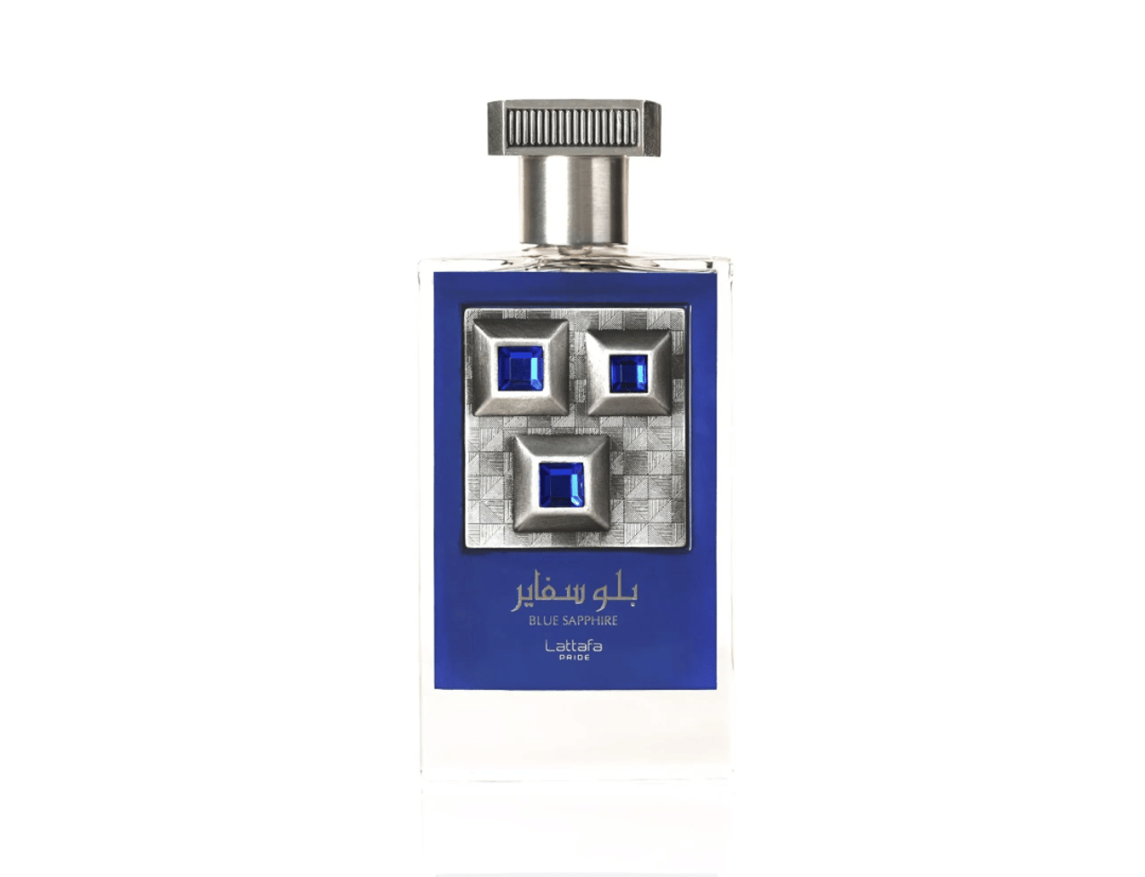 Lattafa Pride Sapphire Blue by Lattafa Pride 100ml EDP — Botol minyak wangi kaca biru dengan penutup bertekstur perak, menampilkan panel perak hiasan dengan tiga permata biru berbentuk segi empat di hadapan.