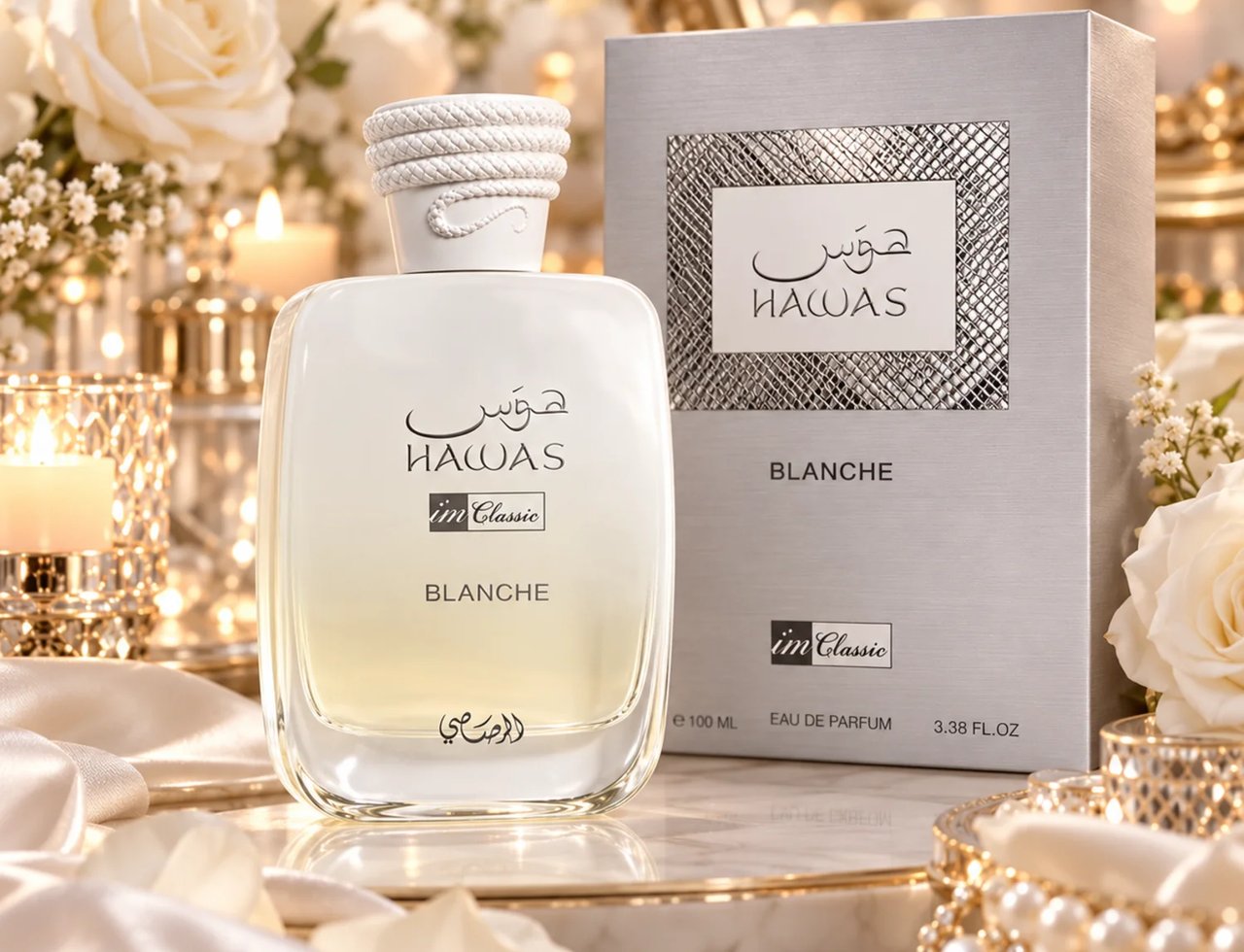 RASASI Hawas Blanche by Rasasi 100ml EDP — White perfume bottle with rope-like cap and silver box, surrounded by white roses and lit candles on a marble tray.