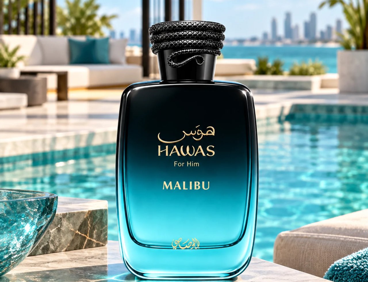 RASASI Hawas Malibu by Rasasi 100ml EDP — Black and blue gradient perfume bottle with braided cap, set by a poolside with a city skyline in the background.