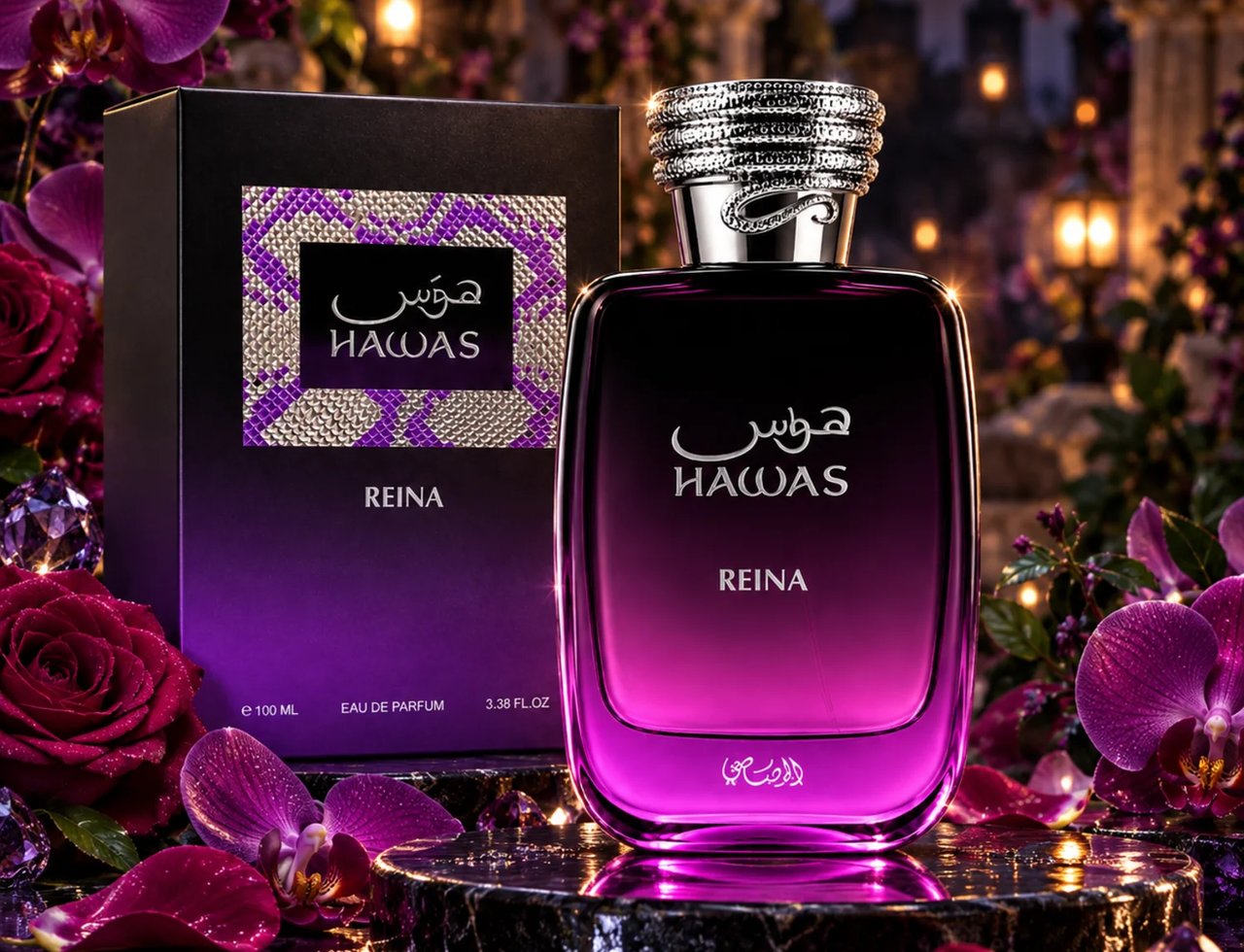RASASI Hawas Reina by Rasasi 100ml EDP — Black box with purple gradient and ornate pattern next to a purple gradient glass perfume bottle with a textured silver cap, surrounded by purple orchids and red roses on a marble surface.