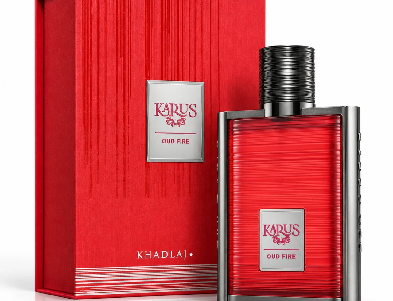 Karus Oud Fire by Khadlaj — Red textured box and glass perfume bottle with silver accents and ribbed black cap, featuring silver labels with brand and product name.