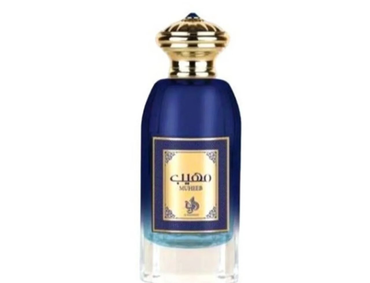Al Wataniah Muheeb Perfume Man by Al Wataniah 100ml — A dark blue glass perfume bottle with a gold ornate cap and a gold label with Arabic script and 'MUHEEB' text. | Al Wataniah Muheeb Perfume Man by Al Wataniah 100ml — Botol kaca biru gelap dengan penutup berhias emas dan label emas dengan tulisan Arab dan teks