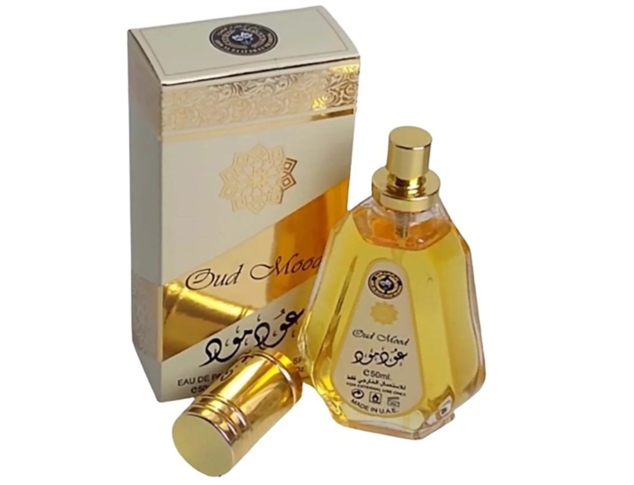 Ard Al Zaafaran Oud Mood by Ard Al Zaafaran 50ml EDP Unisex — Gold-accented box and faceted glass perfume bottle with gold cap detached, on white background.