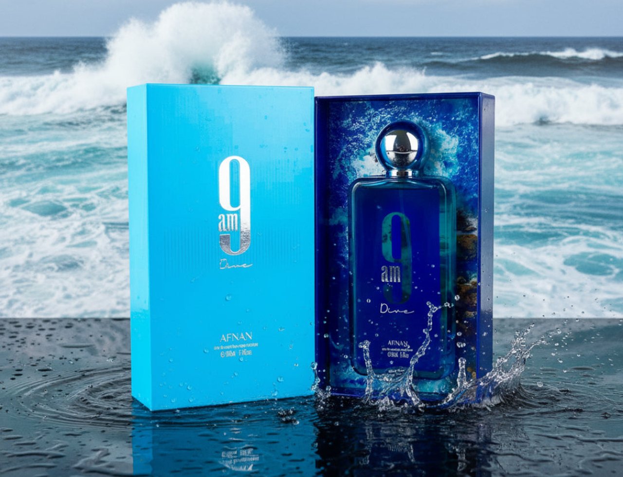 Afnan 9AM Dive by Afnan EDP 100 ml For Men — Blue perfume bottle and box on wet surface with ocean waves crashing behind