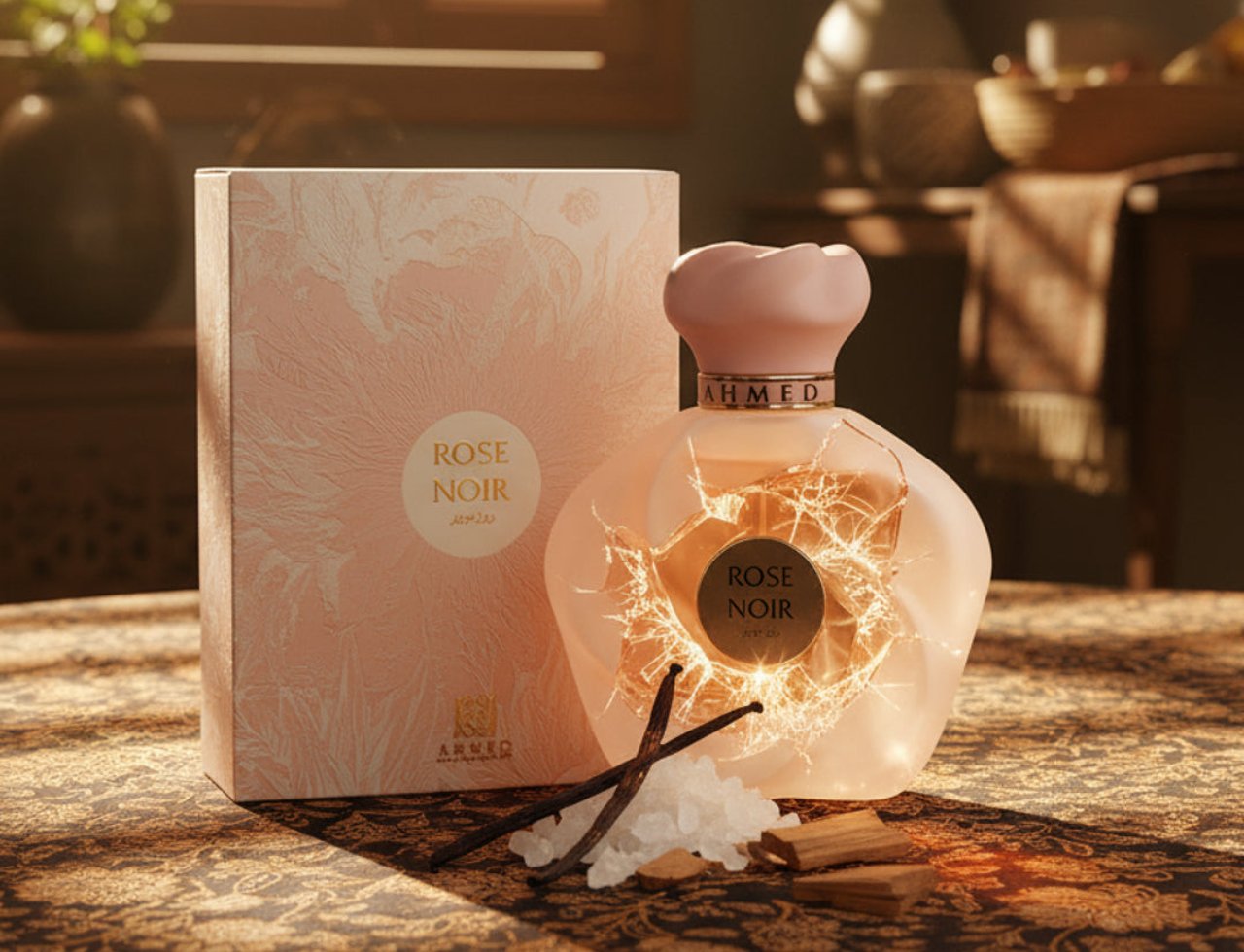 Ahmed Al Maghribi Rose Noir by Ahmed Al Maghribi EDP Women — Pink box and rose-shaped bottle with cracked glass effect, on a