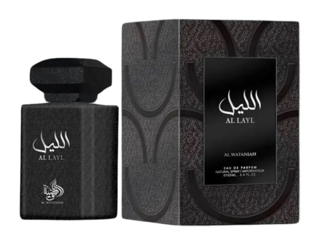 Al Wataniah Al Layl — Black textured perfume bottle and matching box with Arabic script and gold accents