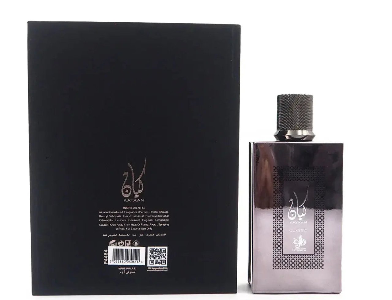Al Wataniah Kayaan Classic by Al Wataniah Homme Intense 100ml For Man — Botol wangian Kayaan Classic dengan penutup kelabu metalik, diletakkan di sebelah kotak hitam yang memaparkan maklumat produk.